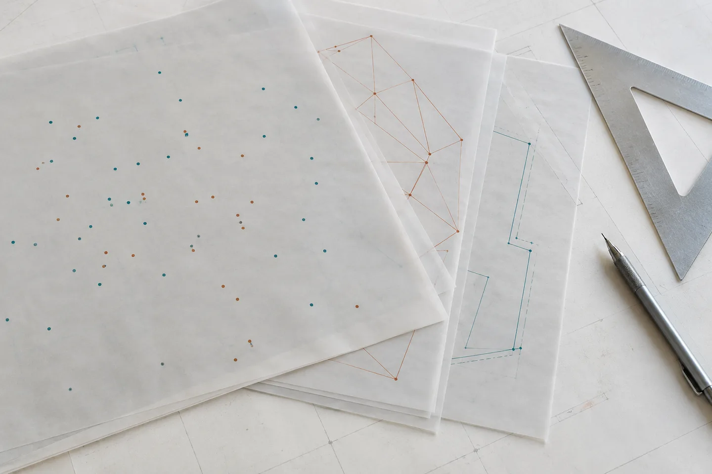 Generated scene: translucent drafting films carrying separate point marks and linework